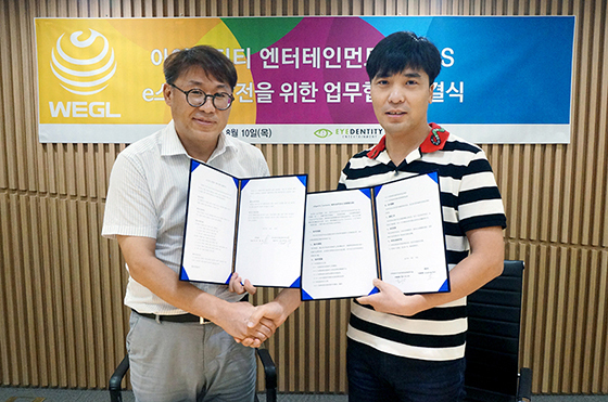 NSP통신-SBS 김용재 글로벌 제작사업팀장(왼쪽)과 아이덴티티 엔터테인먼트 구오하이빈 대표.