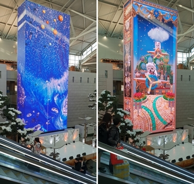 NSP통신-초대형 미디어타워에서 (왼쪽) 독일의 미디어 아티스트인 로만 드 기우리의 작품 뷰티플 월드와 (오른쪽) 인천공항 명예 홍보견 달리가 주인공으로 나오는 레츠 고 달리가 상영되고 있다. (인천국제공항공사)