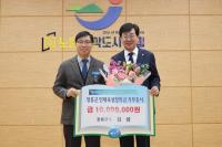 [NSP PHOTO]김성 장흥군수, 새해 1호 인재육성장학금 1천만원 기탁