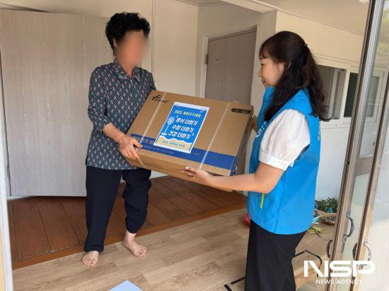 NSP통신-선풍기 전달 (사진 = 광양시청)